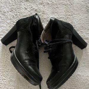 Italian made, high heel leather booties. Suede and smooth leather, lace up.